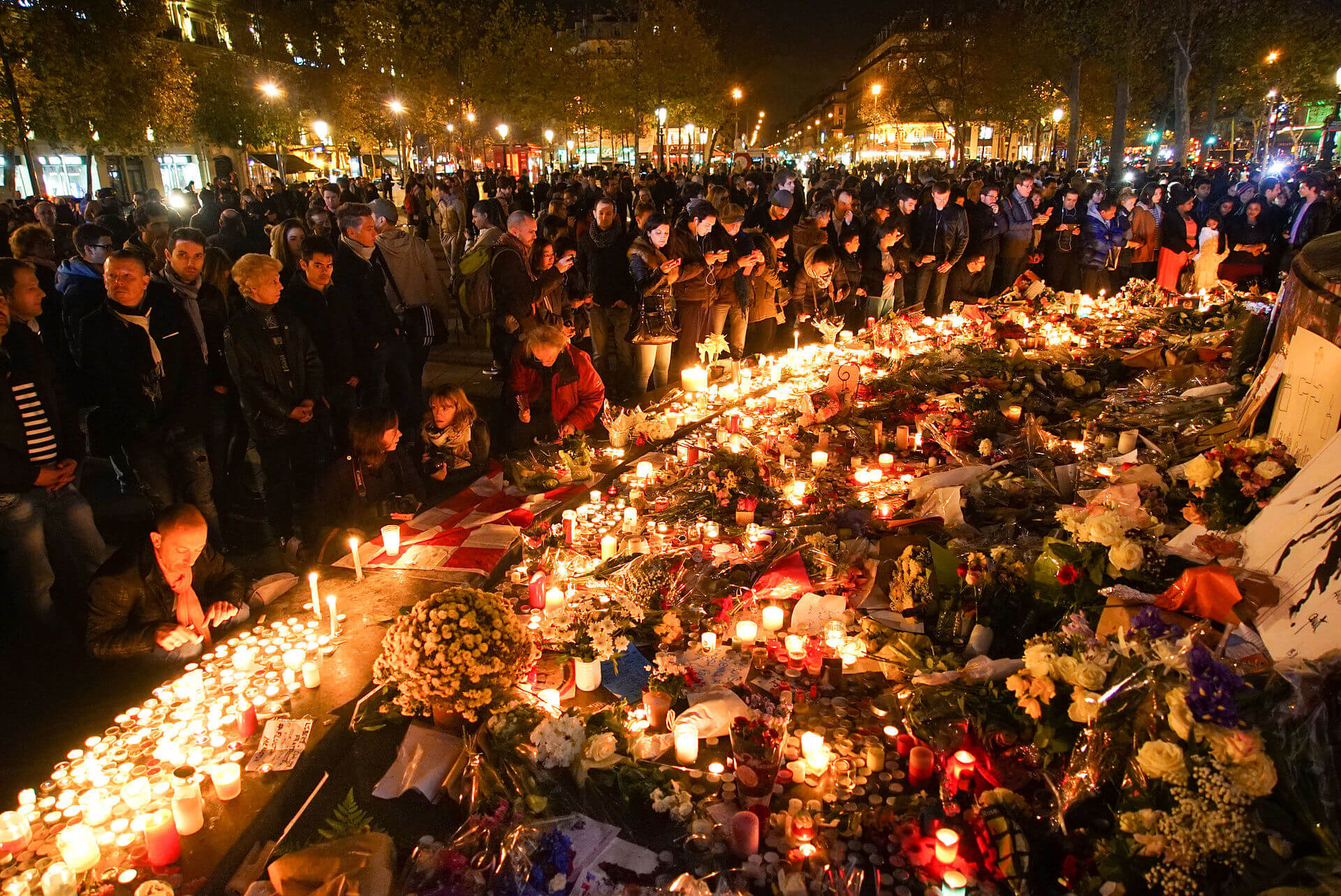 dozens_of_mourning_people_captured_during_civil_service_in_remembrance_of_november_2015_paris_attacks_victims._western_europe_france_paris_place_de_la_republique_november_15_2015