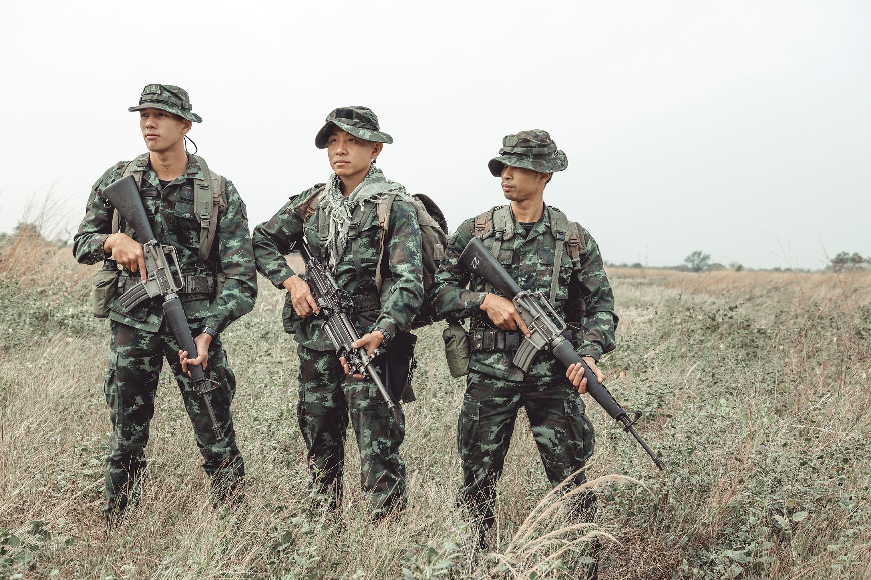Soldiers,Holding,Weapon.,Chinese,Male,Soldiers,Holding,Rifles.,Field,Combat