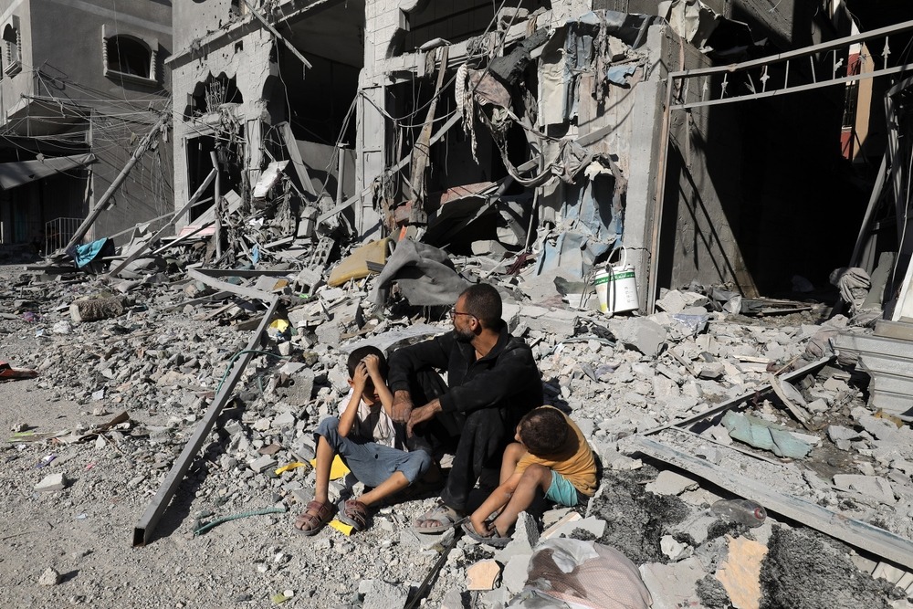 Palestinians,Search,A,House,After,An,Israeli,Air,Strike,,In