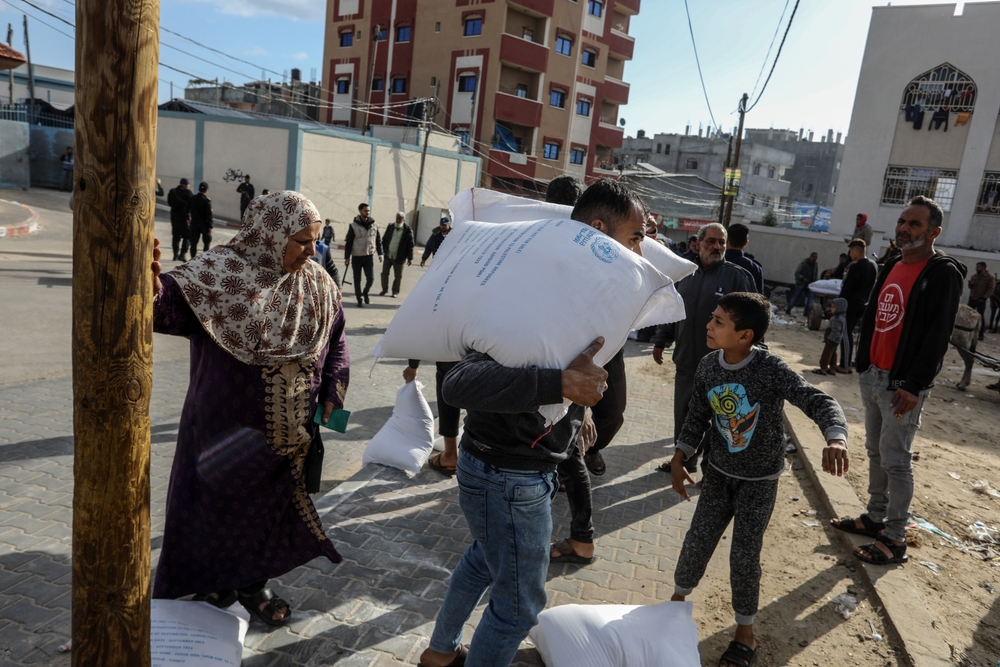 Unrwa,Distributes,Bags,Of,Flour,To,Displaced,Palestinians,From,Beit