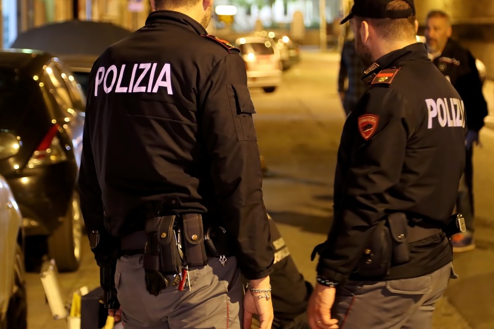 Italian,Police,Officers,Investigating,A,Nighttime,Murder,Scene.,Italian,Police