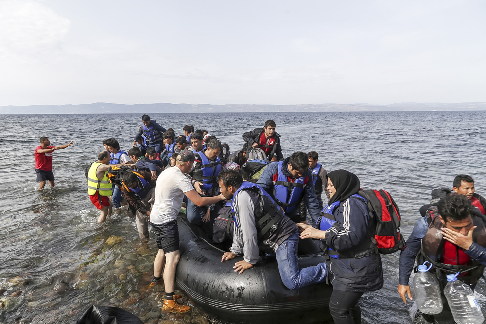 Lesbos,,Greece,,Oktober,11,2015:,Refugees,And,Migrants,Aboard,Dinghies