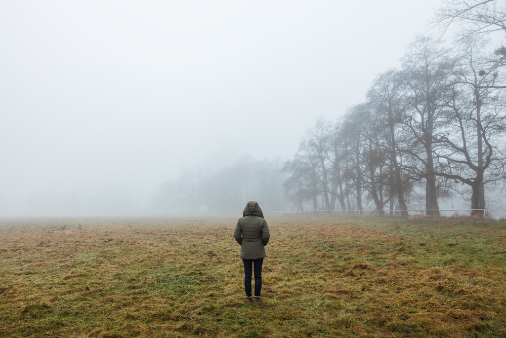 Solitude,Female,Person,In,The,Fog.,Lonely,Woman,In,Hooded