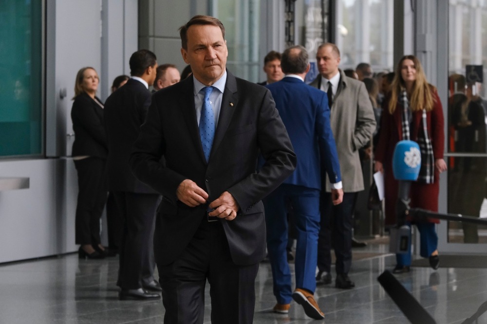 Radoslaw,Sikorski,,Foreign,Minister,Addresses,Media,During,A,Statement,Ahead