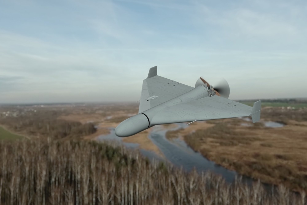 Military,Drone,In,The,Sky,Over,Forest,And,River.