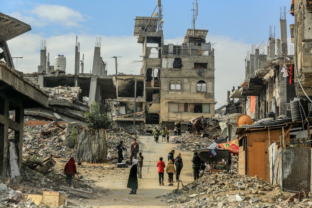 Palestinians,Return,To,Their,Homes,Destroyed,By,The,Israeli,Army